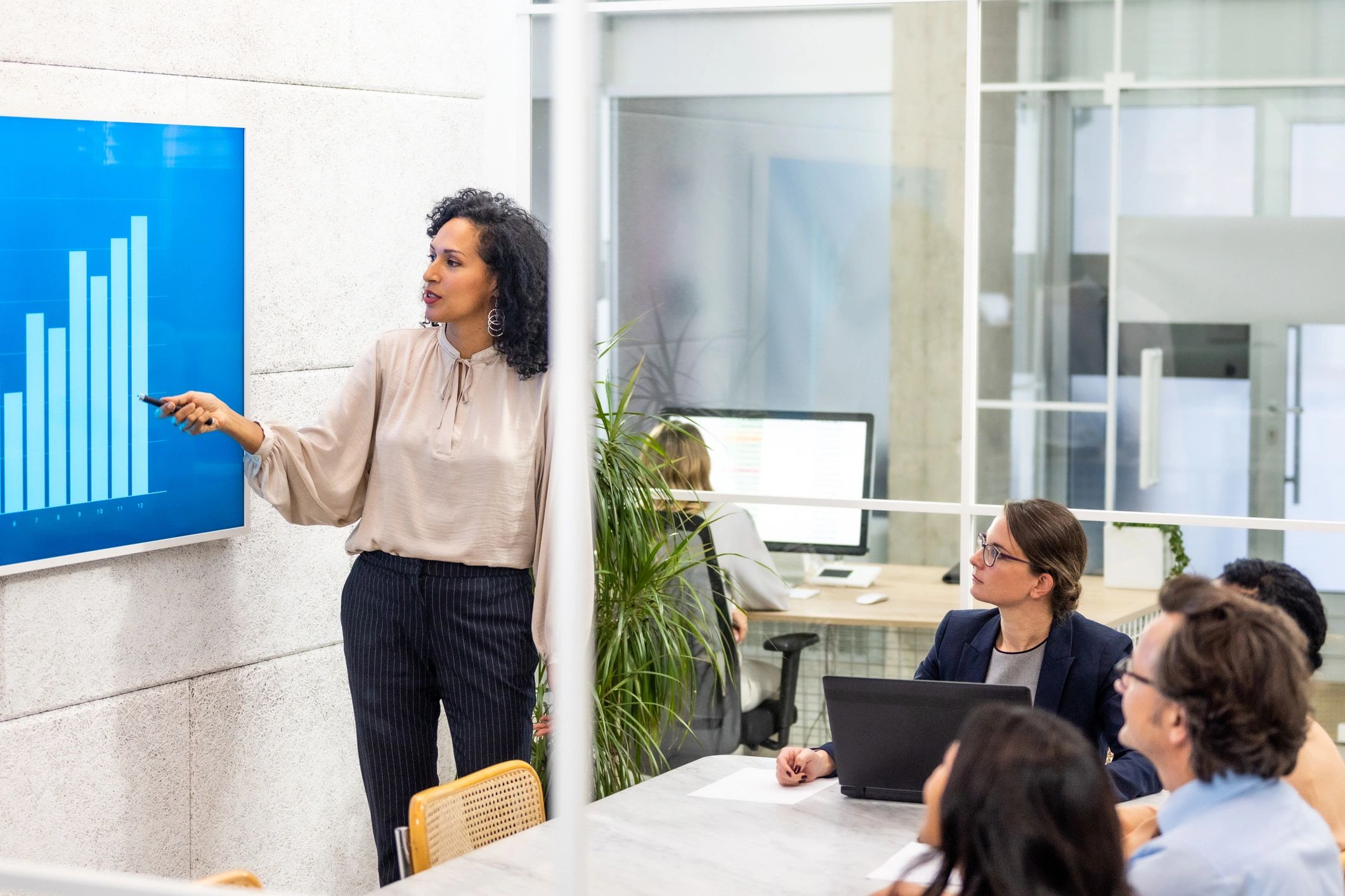 Financial presentation in a corporate meeting room