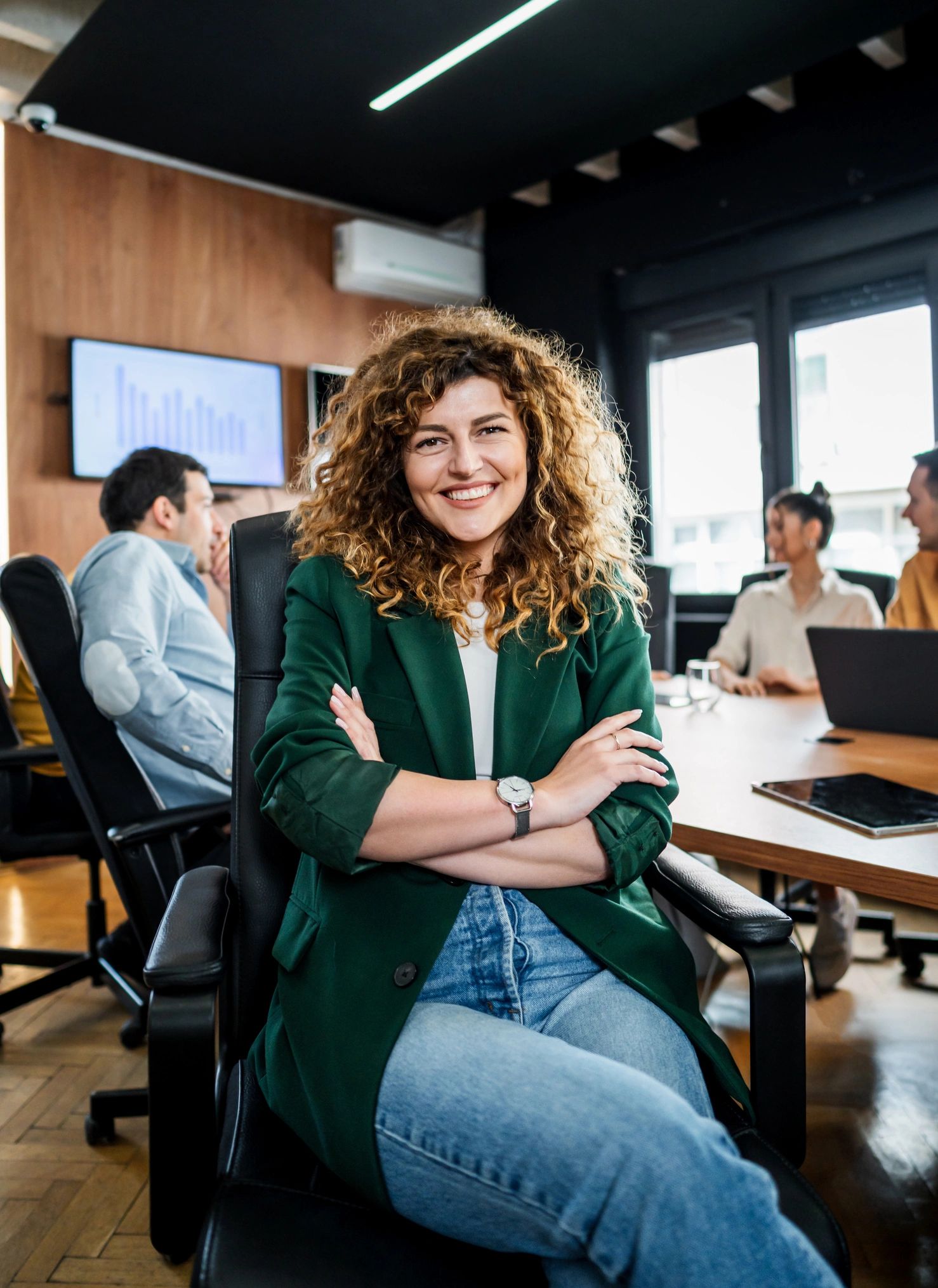 Businesswoman smiling during a meeting